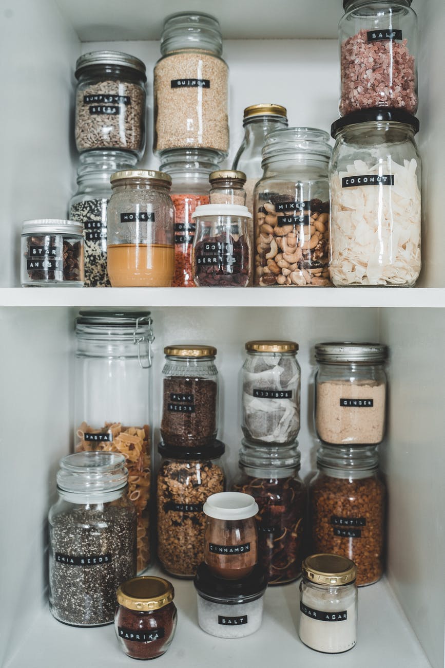 clear glass jars with brown and white beans
